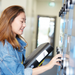 Student Opens Locker At Abbey College Cambridge